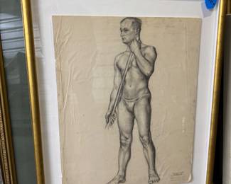 Charcoal figure drawing in frame with glass