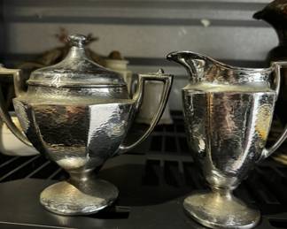 Silver creamer and sugar bowl