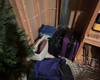 Luggage and 2 Christmas trees available.