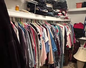 Tons of woman's clothes, all sizes.