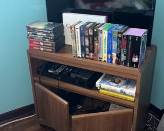 TV- TV Stand- DVD's- VHS- Cd's