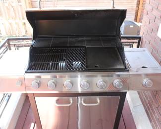BUY IT NOW! $200.00. Dyna-Glo six burner gas grill with side burner.