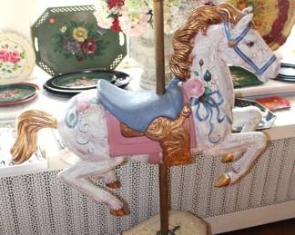Musical carousel horse.