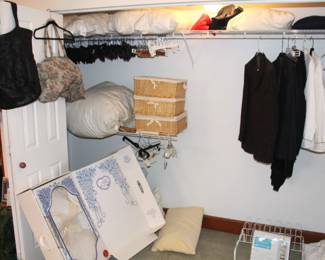 Lots of pillows, wedding dresses, comforters, storage baskets and misc.