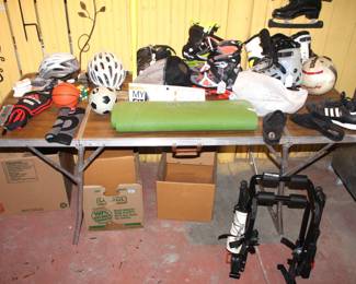 Sporting goods, roller blade boots, new bike rack and more.