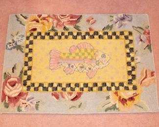 MacKensie Childs hooked rug.