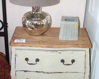 Two drawer night stand with lamp.