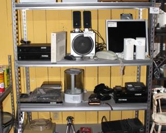 Metal shelf, electronics.