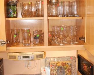 Lots of glassware and clean kitchen items.