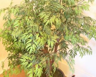 We have a number of silk plants with planters.