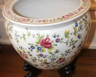 Fishbowl/planter on stand.