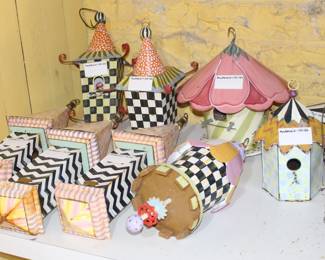 Assorted MacKenzie Childs bird houses and feeders.