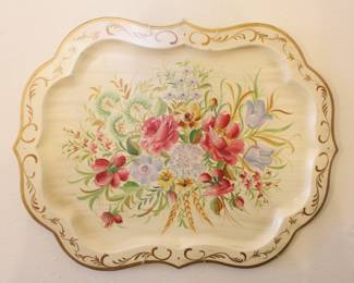 We have a collection of tole painted trays.