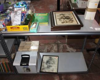Metal shelves, file boxes and frames.