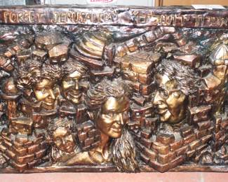 Embossed wall mount.