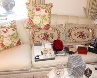 Lots of jewelry bags and boxes, pillows, fans and more.