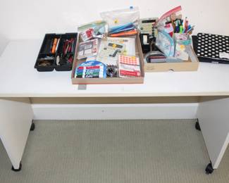 Desk, misc. office supplies.