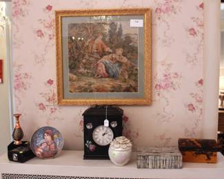 Framed tapestry.