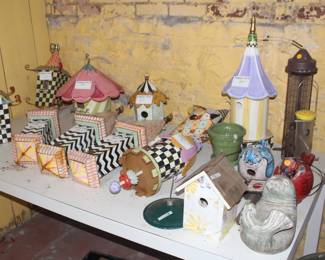 Assorted MacKenzie Childs bird houses and feeders.