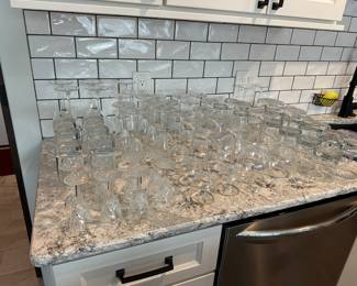 Large stemware and drinking selection including Waterford Crystal