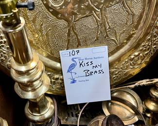 Lot 107: Large Collection of Brass Candlesticks, trivets, a lamp, planter & more! 