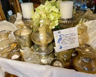 Lot 49: “A GLOWING RECEPTION” a huge themed tablescape box filled with over sixty mercury glass style votives, pillar holders, candles, vintage globes & more