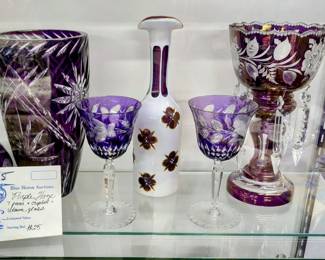 Lot 95: PURPLE HAZE! Shades of violet cut to clear, crystal luster, Moser decanter and art glass.