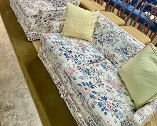 Lot 127: CHOICE OF TWO… But you know you want them both! Love seats, expertly upholstered in a fresh quilted 
Chintz