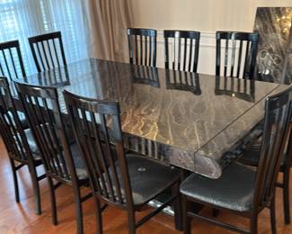 Pre sell item for 850. Table includes 10 chairs, 2-15" leaves, 1 extra chair pad, and table pad set that is new. Table is 84 x 44 x 30.5 with 15" leaves. 