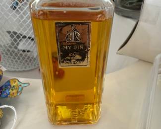 Multiple vintage perfume bottles