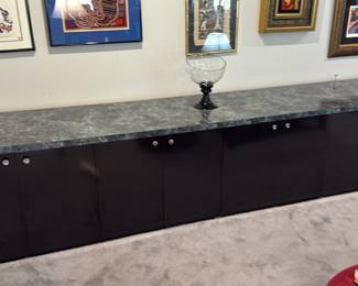 Pre sell item for 400. Custom made cabinet that comes apart in 4 sections. Top is 1 piece and covered in Formica. Dimensions are 133 x 26 x 29 high. Paid 4500 for it 20 years ago. Custom made in NY.