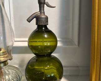 Mid century green glass seltzer bottle.