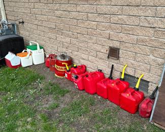 Gas Cans! LOTS OF THEM! And some coolers to boot!