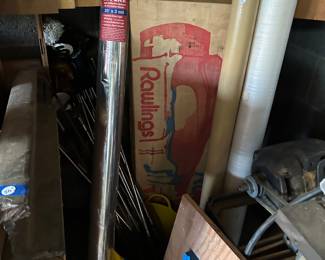 This miscellaneous corner is filled with vintage golf clubs, huge sheets of mylar and more