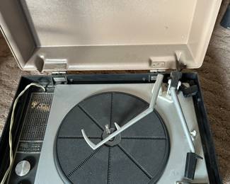 A vintage RCA Portable Stereo Turntable.