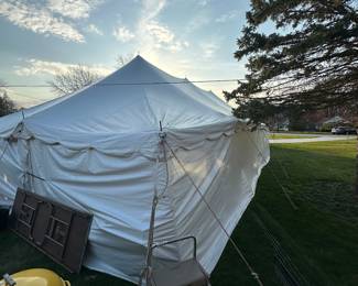 The 35 x 45 tent is FILLED with 20 8 ft. Banquet tables! STUFF to the gills on top and under the tables!