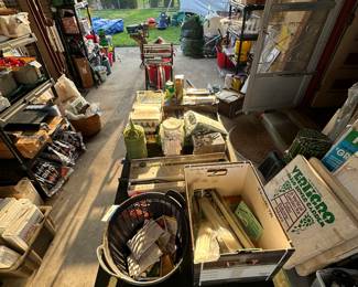 Here’s a full shot of the breezeway filled with 90% garden equipment and this is just one area of multiple that hold guarding equipment and supplies
