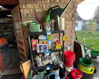 We also have about 60 watering cans and if you look at the last three shelves there, they are filled with unopened garbage bags 13 gallon to 55 gallon