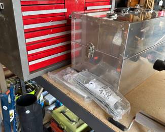 The silver box into center of the picture is a P flight aircraft aluminum precision toolbox in perfect condition never used behind. It is a nice craftsman tool chest.