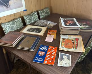 The fantastic MCM Dinging Room Table and Six Chairs has some GREAT vintage books and paraphernalia!