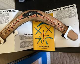 A VEFRY cool Vintage REAL Boomerang and a HOW TO BOOK!
