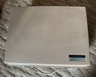 A vintage RCA Portable Stereo Turntable.