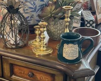 Brass candlesticks, table, blue and white lamp, pineapple decor