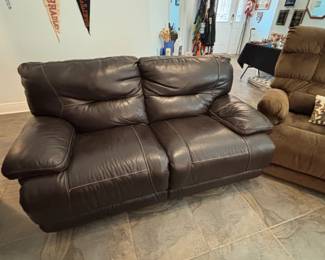 Couch and loveseat, leather one electric one manual. Both clean!