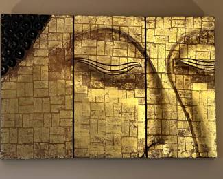 Gold Buddha face wall art