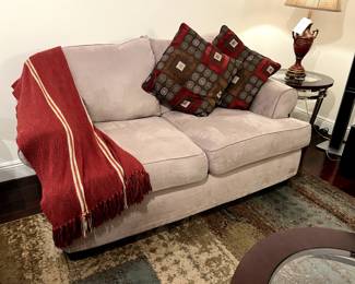 Love seat, pillows and throw, rug