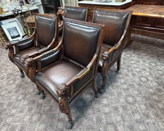 Leather Lion's Head Carved Theodore Alexander Chairs (to be sold in pairs)