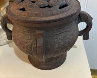 CAST IRON DECORATIVE URN.