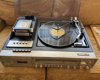 Has it all……. Radio, Record Player, 8 Track, Cassette. (CD not invented yet)