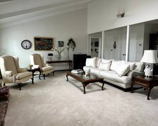 Beautiful furniture selection in living room. Everything at a great price. Don't forget to bring your help if you want to take a piece!